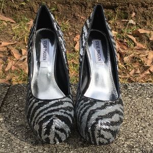 Steve Madden zebra print sequined pumps.